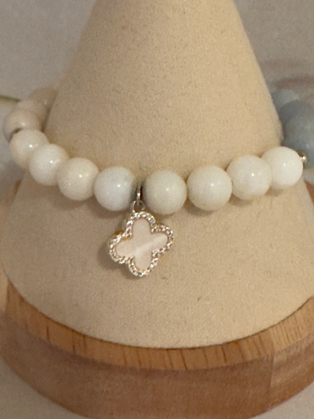 Delicate White Beaded Bracelet with Clover Charm